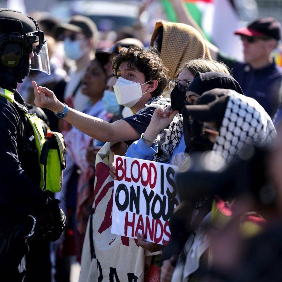 Ottawa police arrest 13 anti-war protesters demonstrating against arms show